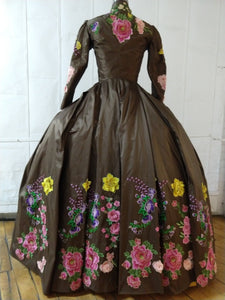 With heavy floral decoration Brown silk dress