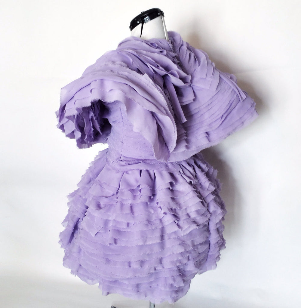 effie trinket purple dress The many looks of Effie Trinket