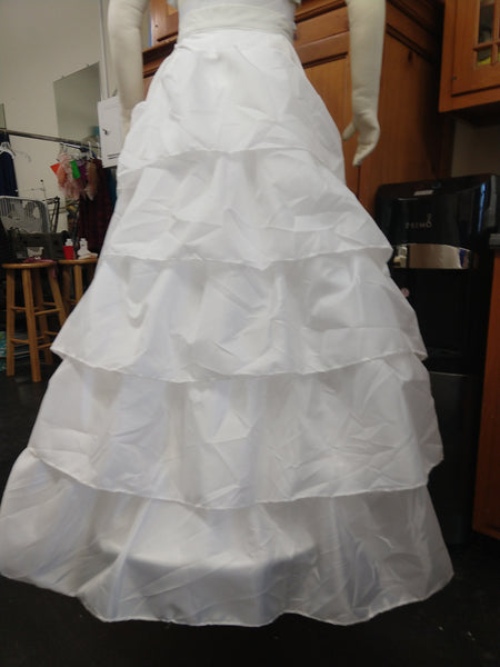 With attached petticoat and back ruffles Victorian cage bustle