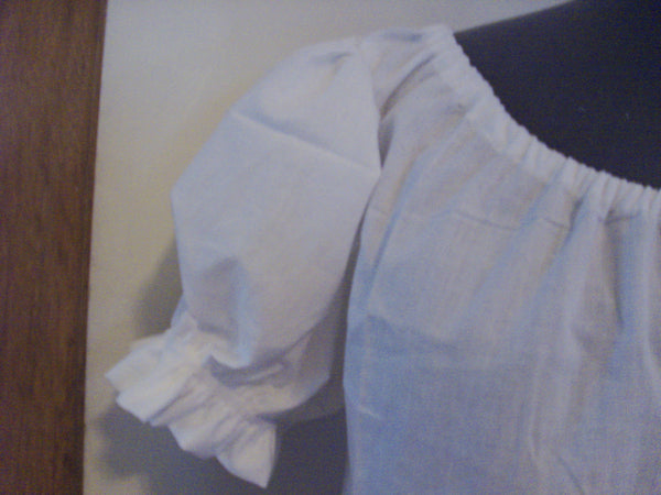 Short puffed sleeves with white Peasant Blouse