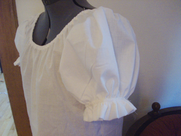 Short puffed sleeves with white Peasant Blouse